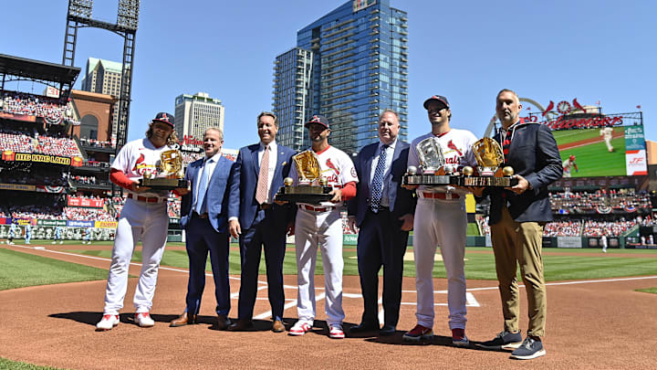 Apr 2, 2023; St. Louis, Missouri, USA; St. Louis Cardinals second baseman Brendan Donovan (33) manager Oliver Marmol (37) and third baseman Nolan Arenado (28) poses for a photo with their Rawlings platinum and gold glove awards before a game against the Toronto Blue Jays at Busch Stadium. Mandatory Credit: Jeff Curry-Imagn Images Apr 2, 2023; St. Louis, Missouri, USA; St. Louis Cardinals second baseman Brendan Donovan (33) manager Oliver Marmol (37) and third baseman Nolan Arenado (28) poses for a photo with their Rawlings platinum and gold glove awards before a game against the Toronto Blue Jays at Busch Stadium. Mandatory Credit: Jeff Curry-Imagn Images