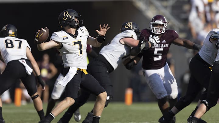 Sep 10, 2022; College Station, Texas, USA; Appalachian State Mountaineers quarterback Chase Brice (7) drops back to pass against the Texas A&M Aggies in the fourth quarter at Kyle Field. Appalachian State Mountaineers won 17 to 14. Mandatory Credit: Thomas Shea-Imagn Images