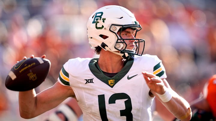 Baylor's Sawyer Robertson (13) throws a pass in the second half of the college football game between the Oklahoma State Cowboys and the Baylor Bears at Boone Pickens Stadium in Stillwater, Okla., Saturday, Sept. 27, 2025.