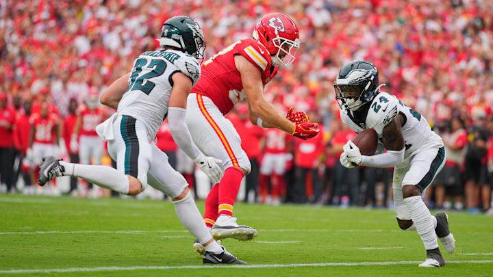 Sep 14, 2025; Kansas City, Missouri, USA; Philadelphia Eagles safety Andrew Mukuba (24) intercepts a pass intended for Kansas City Chiefs tight end Travis Kelce (87) during the fourth quarter of the game at GEHA Field at Arrowhead Stadium. Mandatory Credit: Jay Biggerstaff-Imagn Images Sep 14, 2025; Kansas City, Missouri, USA; Philadelphia Eagles safety Andrew Mukuba (24) intercepts a pass intended for Kansas City Chiefs tight end Travis Kelce (87) during the fourth quarter of the game at GEHA Field at Arrowhead Stadium. Mandatory Credit: Jay Biggerstaff-Imagn Images