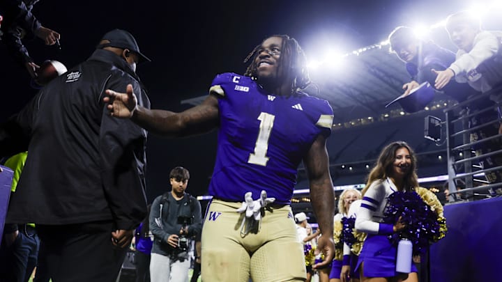 Sep 6, 2025; Seattle, Washington, USA; Washington Huskies running back Jonah Coleman (1) returns to the locker room following a victory against the UC Davis Aggies at Husky Stadium. Mandatory Credit: Joe Nicholson-Imagn Images