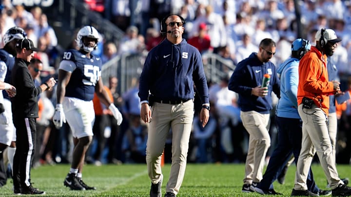Penn State Nittany Lions head coach James Franklin walks up the sideline during the second half of the NCAA football game against the Ohio State Buckeyes at Beaver Stadium.