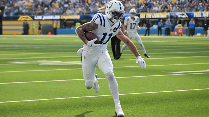 Oct 19, 2025; Inglewood, California, USA; Indianapolis Colts wide receiver Michael Pittman Jr. (11) runs the ball for a touchdown in the first quarter against the Los Angeles Chargers at SoFi Stadium. Mandatory Credit: Jayne Kamin-Oncea-Imagn Images Oct 19, 2025; Inglewood, California, USA; Indianapolis Colts wide receiver Michael Pittman Jr. (11) runs the ball for a touchdown in the first quarter against the Los Angeles Chargers at SoFi Stadium. Mandatory Credit: Jayne Kamin-Oncea-Imagn Images