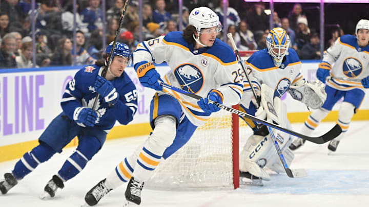 Nov 4, 2023; Toronto, Ontario, CAN;   Buffalo Sabres defenseman Owen Power (25) skates the puck away