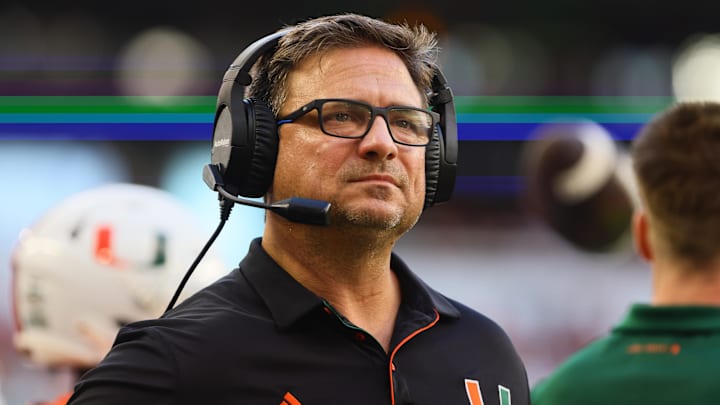 Sep 7, 2024; Miami Gardens, Florida, USA; Miami Hurricanes offensive coordinator Shannon Dawson looks on from the sideline against the Florida A&M Rattlers during the first quarter at Hard Rock Stadium. Mandatory Credit: Sam Navarro-Imagn Images