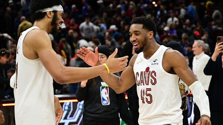 Jan 8, 2025; Cleveland, Ohio, USA; Cleveland Cavaliers guard Donovan Mitchell (45) celebrates with center Jarrett Allen (31) after the Cavaliers beat the Oklahoma City Thunder at Rocket Mortgage FieldHouse. Mandatory Credit: Ken Blaze-Imagn Images Jan 8, 2025; Cleveland, Ohio, USA; Cleveland Cavaliers guard Donovan Mitchell (45) celebrates with center Jarrett Allen (31) after the Cavaliers beat the Oklahoma City Thunder at Rocket Mortgage FieldHouse. Mandatory Credit: Ken Blaze-Imagn Images