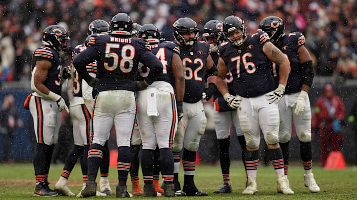 Dec 31, 2023; Chicago, Illinois, USA;  The Chicago Bears huddle up during a game against the Atlanta Falcons at Soldier Field. Mandatory Credit: Jamie Sabau-Imagn Images