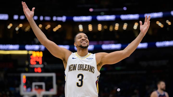 Mar 11, 2025; New Orleans, Louisiana, USA; New Orleans Pelicans guard CJ McCollum (3) reacts after a three-point basket against the Los Angeles Clippers during the fourth quarter at Smoothie King Center. Mandatory Credit: Matthew Hinton-Imagn Images