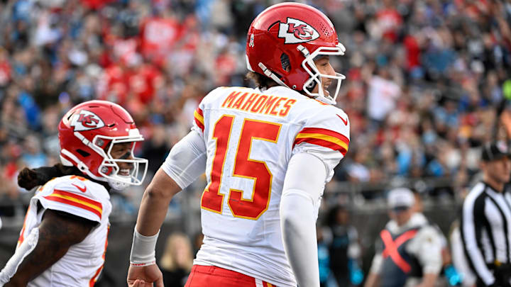 Nov 24, 2024; Charlotte, North Carolina, USA; Kansas City Chiefs wide receiver DeAndre Hopkins (8) celebrates with quarterback Patrick Mahomes (15) after scoring a touchdown in the third quarter at Bank of America Stadium. Mandatory Credit: Bob Donnan-Imagn Images