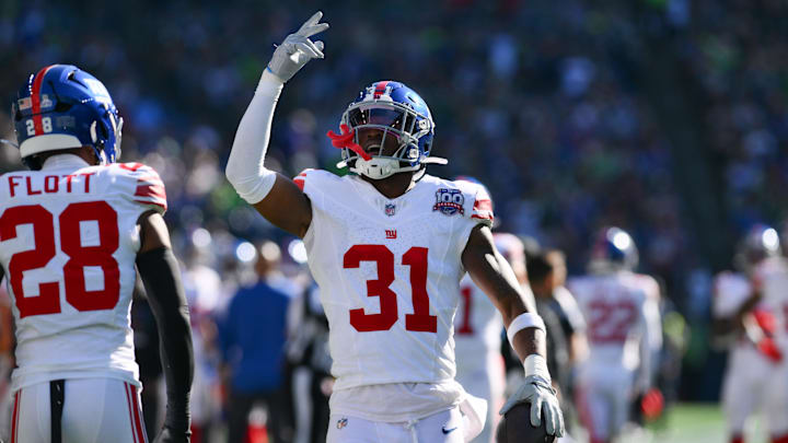 Oct 6, 2024; Seattle, Washington, USA; New York Giants safety Tyler Nubin (31) celebrates after recovering a Seattle Seahawks fumble during the second half at Lumen Field.  