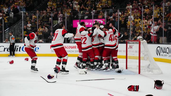 Jun 14, 2026; Las Vegas, Nevada, USA; Carolina Hurricanes players celebrate the win against the Vegas Golden Knights in game six of the 2026 Stanley Cup Final at T-Mobile Arena. Mandatory Credit: Stephen R. Sylvanie-Imagn Images