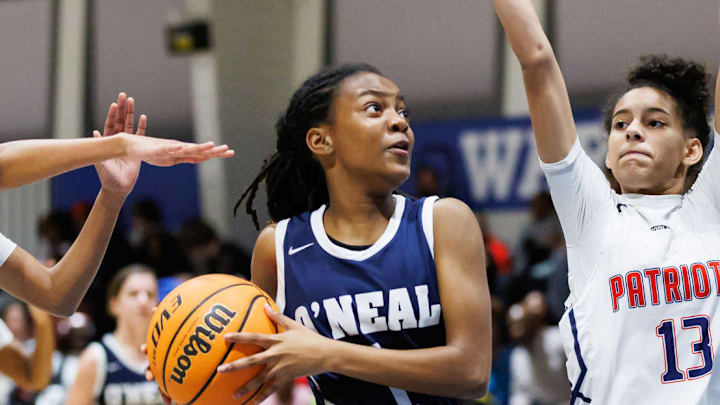 North Carolina girls basketball with O'Neal School's Judah Sibley driving toward the hoop against Freedom Christian Academy North Carolina girls basketball with O'Neal School's Judah Sibley driving toward the hoop against Freedom Christian Academy