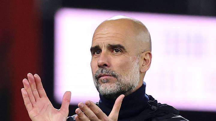 Pep Guardiola claps during Bournemouth v Manchester City