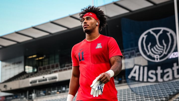 Arizona player warming up ahead of its game against Weber State