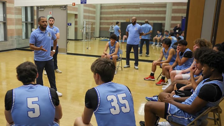 Palisades boys basketball coach Jeff Bryant talks to his team in the locker room. Palisades boys basketball coach Jeff Bryant talks to his team in the locker room.