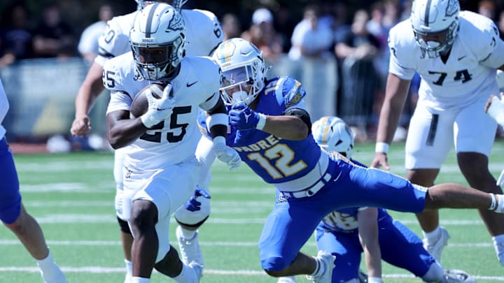 St. John Bosco junior RB Maliq Allen shown here last year racing for a touchdown against San Mateo Serra is part of California's new top-ranked team. 