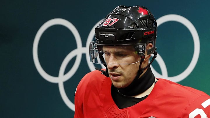 Feb 18, 2026; Milan, Italy; Sidney Crosby of Canada walks out to the ice before a men's ice hockey quarterfinal during the Milano Cortina 2026 Olympic Winter Games at Milano Santagiulia Ice Hockey Arena. Mandatory Credit: Geoff Burke-Imagn Images