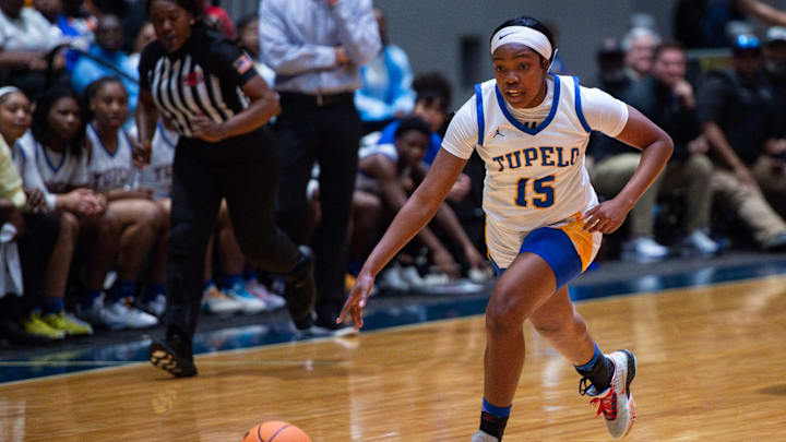 Tupelo Lady Wave's shooting guard Bailey Siddell (15) drives the ball down the court during the MHSAA Class 7A state final game against the Germantown Lady Mavericks at the Mississippi Coliseum in Jackson, Miss., on Saturday, Mar. 2, 2024.