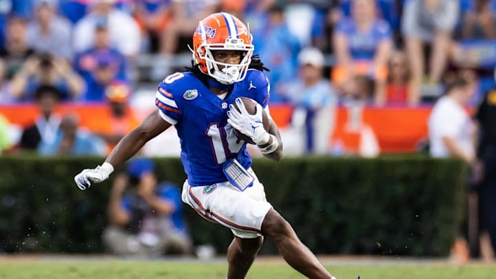 Sep 14, 2024; Gainesville, Florida, USA; Florida Gators wide receiver Tank Hawkins (10) runs with the ball against the Texas A&M Aggies during the second half at Ben Hill Griffin Stadium. Mandatory Credit: Matt Pendleton-Imagn Images