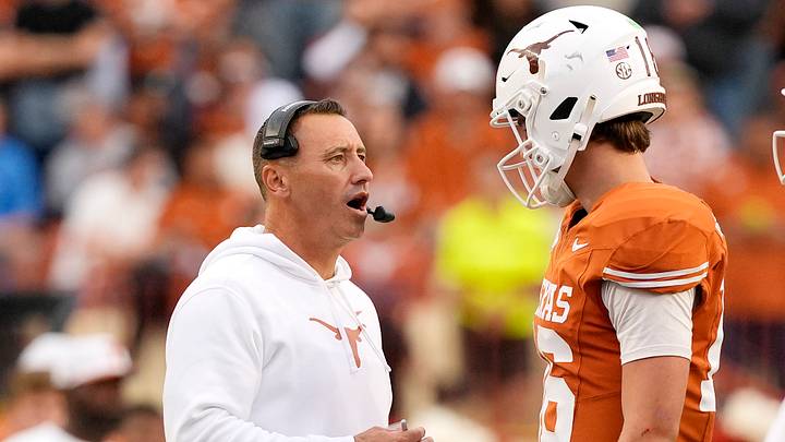 Texas Longhorns head coach Steve Sarkisian talks with quarterback Arch Manning (16) during a timeout in the second half against the Vanderbilt Commodores at Darrell K Royal-Texas Memorial Stadium. Texas Longhorns head coach Steve Sarkisian talks with quarterback Arch Manning (16) during a timeout in the second half against the Vanderbilt Commodores at Darrell K Royal-Texas Memorial Stadium.