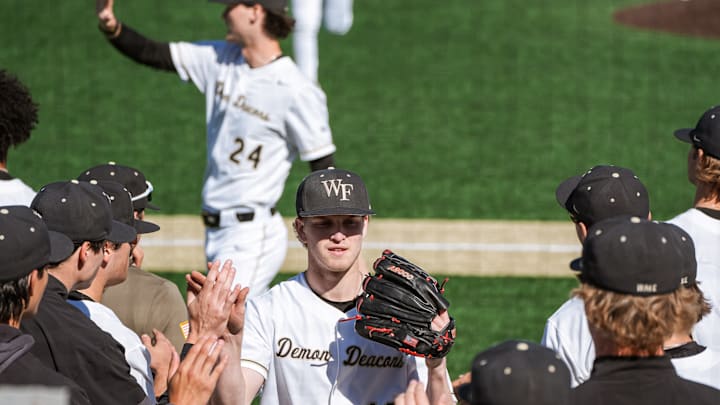 Wake Forest pitcher Chris Levonas heads to the dugout after inning against California Wake Forest pitcher Chris Levonas heads to the dugout after inning against California