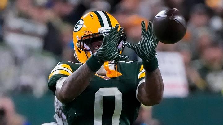 Green Bay Packers wide receiver Matthew Golden (0) catches a pass against the Carolina Panthers. Green Bay Packers wide receiver Matthew Golden (0) catches a pass against the Carolina Panthers.