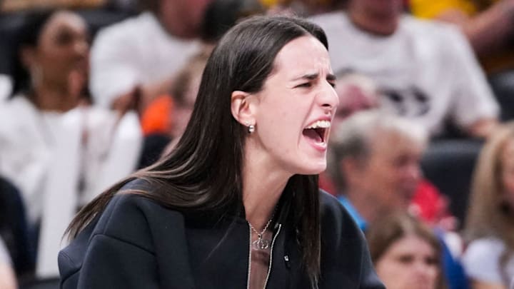 Indiana Fever guard Caitlin Clark (22) celebrates from the bench Tuesday, Aug. 26, 2025, during a game between the Indiana Fever and the Seattle Storm at Gainbridge Fieldhouse in Indianapolis. The Indiana Fever defeated the Seattle Storm, 95-75.