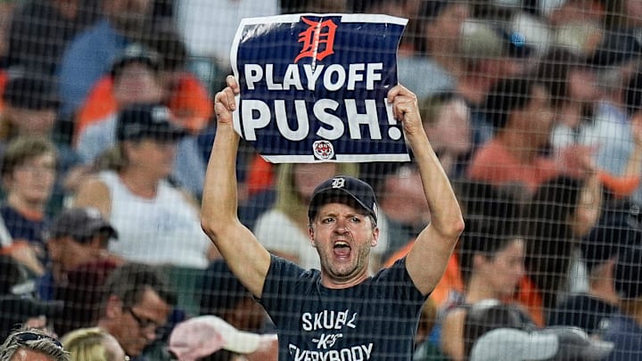 A Detroit Tigers fan holds a Playoff Push sign to cheer for the Tigers during the sixth inning against Baltimore Orioles at Comerica Park in Detroit on Saturday, September 14, 2024. A Detroit Tigers fan holds a Playoff Push sign to cheer for the Tigers during the sixth inning against Baltimore Orioles at Comerica Park in Detroit on Saturday, September 14, 2024.