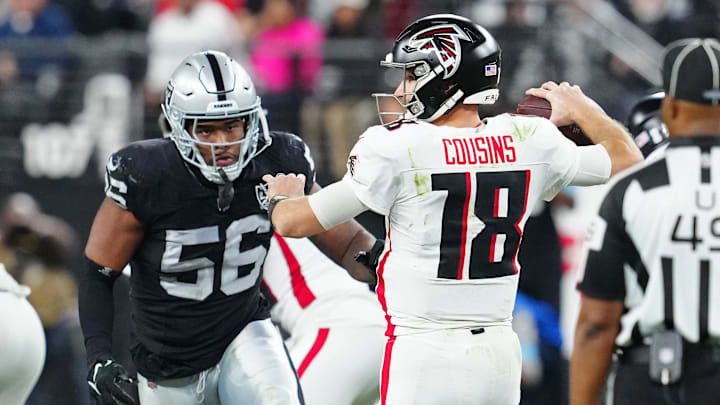 Dec 16, 2024; Paradise, Nevada, USA; Las Vegas Raiders linebacker Amari Burney (56) looks to sack Atlanta Falcons quarterback Kirk Cousins (18) during the third quarter at Allegiant Stadium. Mandatory Credit: Stephen R. Sylvanie-Imagn Images