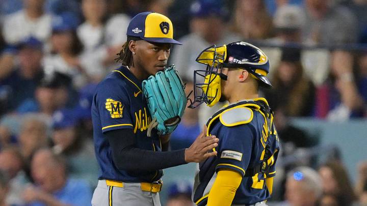 Oct 14, 2026; Los Angeles, California, USA;  Milwaukee Brewers catcher William Contreras (24) talks with pitcher Abner Uribe (45) on the mound during the sixth inning against the Los Angeles Dodgers in game three of the NLCS for the 2026 MLB Playoffs at Uniqlo Field at Dodger Stadium.  Mandatory Credit: Jayne Kamin-Oncea-Imagn Images
