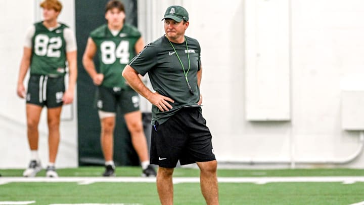 Michigan State's head coach Jonathan Smith looks on during camp on Monday, Aug. 5, 2024, at the indoor practice facility in East Lansing.