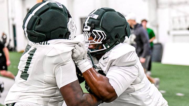 Michigan State's Nick Sharpe, right, and Robert Wright Jr. run a drill during spring football practice on Tuesday, March 24, 2026, in East Lansing. Michigan State's Nick Sharpe, right, and Robert Wright Jr. run a drill during spring football practice on Tuesday, March 24, 2026, in East Lansing.
