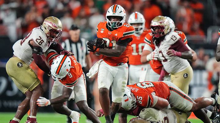 Miami running back Javian Mallory carries the ball against Florida State. The Hurricanes are projected to be national title game participants again this season. Miami running back Javian Mallory carries the ball against Florida State. The Hurricanes are projected to be national title game participants again this season.