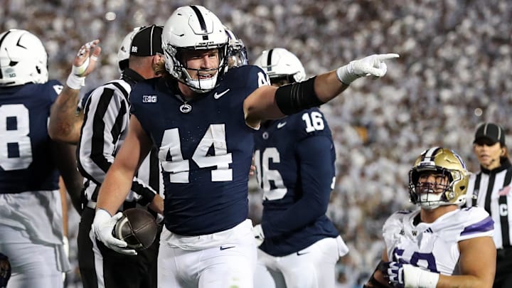 Nov 9, 2024; University Park, Pennsylvania, USA; Penn State Nittany Lions tight end Tyler Warren (44) reacts after scoring a touchdown against the Washington Huskies during the second quarter at Beaver Stadium. Mandatory Credit: Matthew O'Haren-Imagn Images