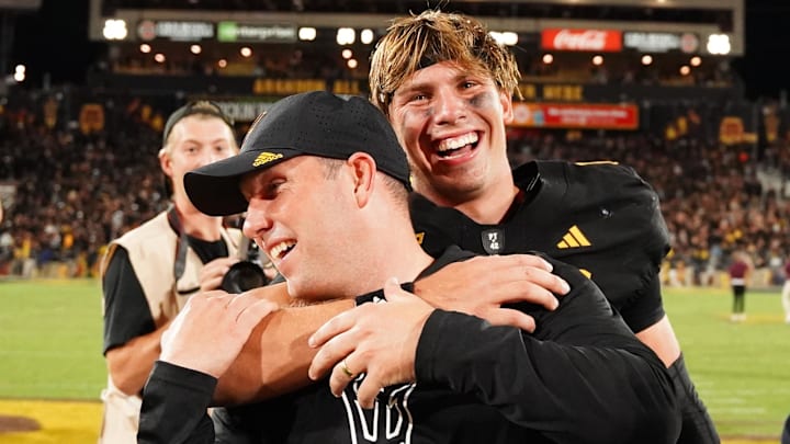 Sep 26, 2025; Tempe, Arizona, USA; Arizona State Sun Devils quarterback Sam Leavitt (10) celebrates with head coach Kenny Dillingham after their win against TCU Horned Frogs at Mountain America Stadium, Home of the ASU Sun Devils. Mandatory Credit: Jacob Reiner-Imagn Images