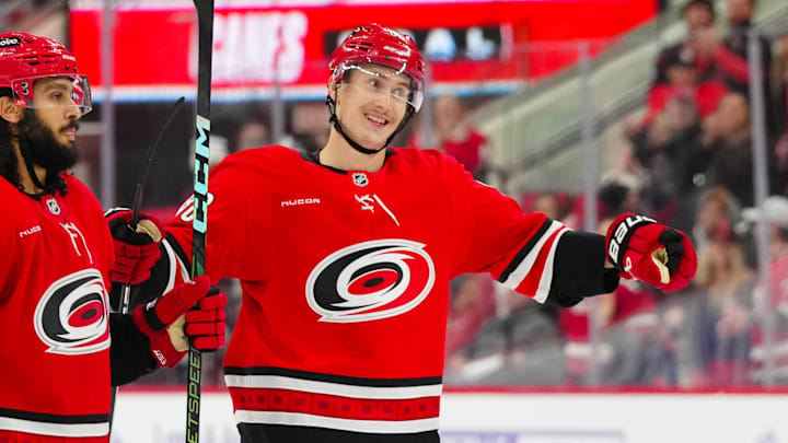 Nov 17, 2024; Raleigh, North Carolina, USA;  Carolina Hurricanes center Martin Necas (88) celebrates his goal against the St. Louis Blues during the third period at Lenovo Center. Mandatory Credit: James Guillory-Imagn Images