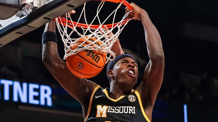 Feb 7, 2026; Columbia, South Carolina, USA; Missouri Tigers forward Mark Mitchell (25) dunks against the South Carolina Gamecocks in the second half at Colonial Life Arena. Mandatory Credit: Jeff Blake-Imagn Images