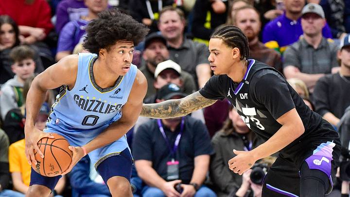 Dec 23, 2025; Salt Lake City, Utah, USA; Memphis Grizzlies forward Jaylen Wells (0) looks to pass around Utah Jazz guard Keyonte George (3) during the second half at Delta Center. Mandatory Credit: Peter Creveling-Imagn Images Dec 23, 2025; Salt Lake City, Utah, USA; Memphis Grizzlies forward Jaylen Wells (0) looks to pass around Utah Jazz guard Keyonte George (3) during the second half at Delta Center. Mandatory Credit: Peter Creveling-Imagn Images