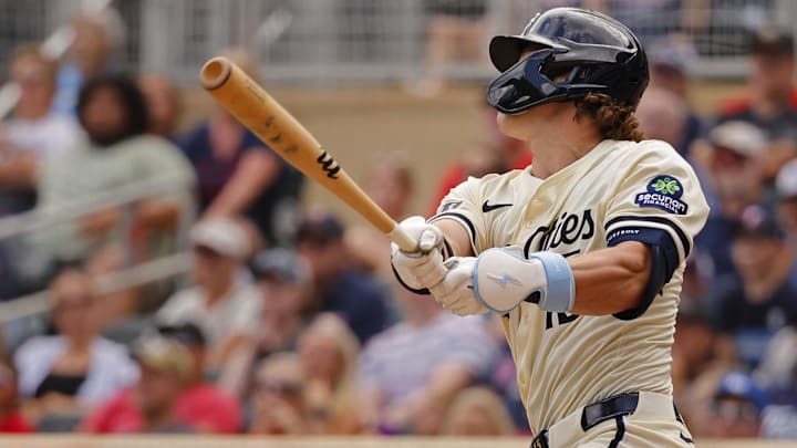 Aug 10, 2025; Minneapolis, Minnesota, USA; Minnesota Twins second baseman Luke Keaschall (15) hits a two-run walk-off home run against the Kansas City Royals in the 11th inning at Target Field.
