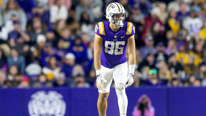 Nov 30, 2024; Baton Rouge, Louisiana, USA;  LSU Tigers tight end Mason Taylor (86) looks on against the Oklahoma Sooners during the first quarter at Tiger Stadium. Mandatory Credit: Stephen Lew-Imagn Images