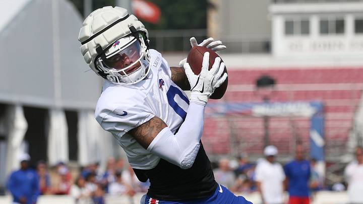 Bills wide receiver Keon Coleman pulls in a pass close to the sideline. Bills wide receiver Keon Coleman pulls in a pass close to the sideline.