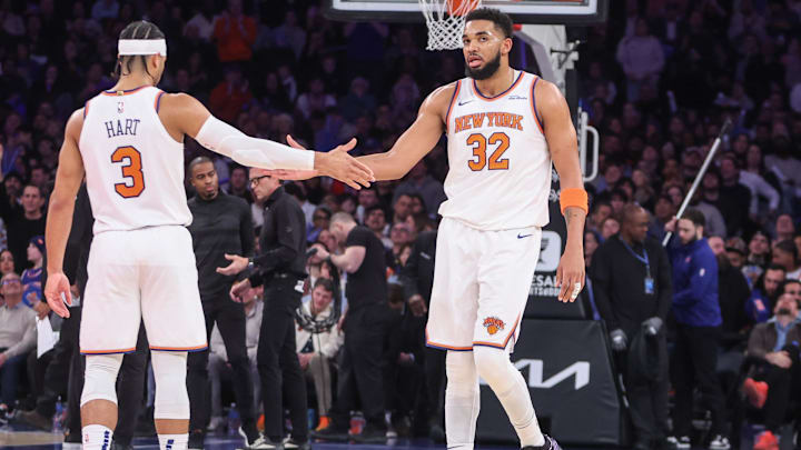 Feb 12, 2025; New York, New York, USA;  New York Knicks center Karl-Anthony Towns (32) is greeted by guard Josh Hart (3) during a timeout in the second quarter against the Atlanta Hawks at Madison Square Garden. Mandatory Credit: Wendell Cruz-Imagn Images