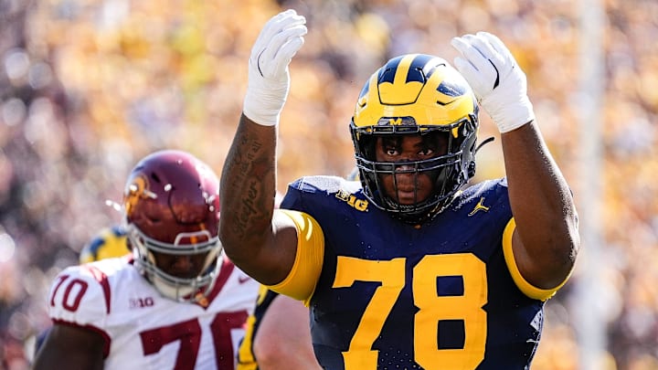 Michigan defensive lineman Kenneth Grant (78) celebrates a tackle against USC during the first half at Michigan Stadium in Ann Arbor on Saturday, Sept. 21, 2024.