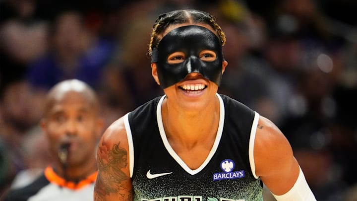 New York Liberty guard Natasha Cloud (9) smiles during action against the Phoenix Mercury in the first half of Game One of the 2025 WNBA Playoffs first round at PHX Arena on Sept. 14, 2025.