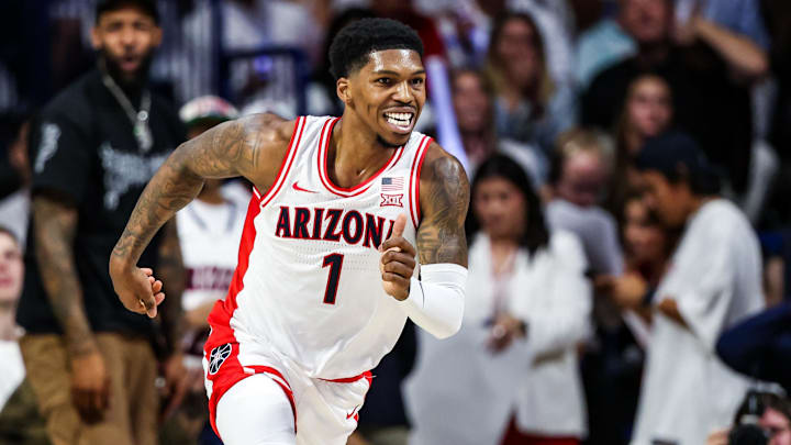 Nov 22, 2024; Tucson, Arizona, USA; Arizona Wildcats guard Caleb Love (1) smiles after a three pointer was made during the first half against the Duke Blue Devils at McKale Center.
