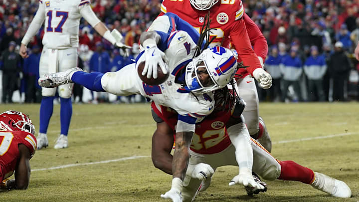 Jan 26, 2025; Kansas City, MO, USA; Buffalo Bills running back James Cook (4) dives for a touchdown against the Kansas City Chiefs during the second half in the AFC Championship game at GEHA Field at Arrowhead Stadium. Mandatory Credit: Denny Medley-Imagn Images
