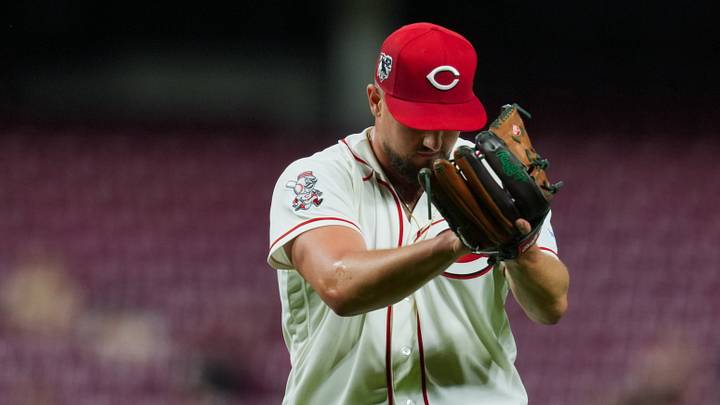 Apr 15, 2026; Cincinnati, Ohio, USA;  Cincinnati Reds pitcher Graham Ashcraft claps his hands as he walks to the dugout during the game against the San Francisco Giants in the eighth inning at Great American Ball Park. Players and coaches will wear No. 42 in honor of Jackie Robinson Day around the league. Mandatory Credit: Aaron Doster-Imagn Images