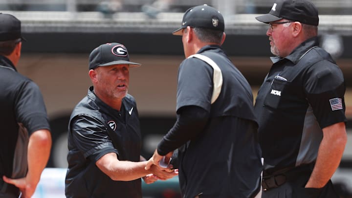 Georgia coach Wes Johnson shakes hand with Army coach Chris Tracz before a NCAA Athens Regional baseball game against Army in Athens, Ga., on Friday, May 31, 2024. Georgia won 8-7.