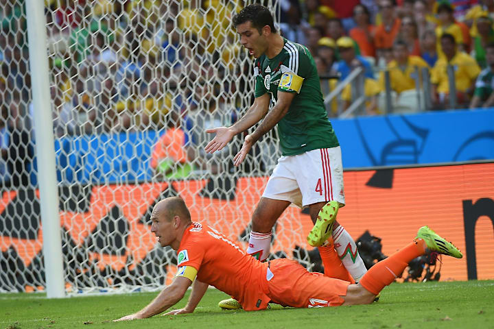 Rafael Marquez and Arjen Robben