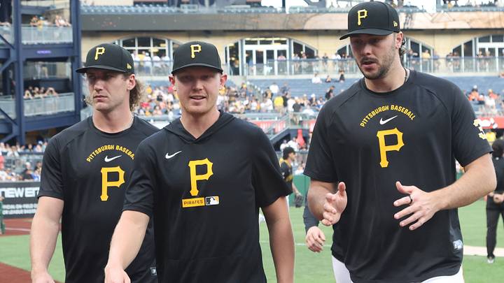 Jun 10, 2026; Pittsburgh, Pennsylvania, USA;  Pittsburgh Pirates starting pitchers Braxton Ashcraft (left) and Mitch Keller (middle) and Paul Skenes (right) walk in from the bullpen against the Los Angeles Dodgers at PNC Park. Mandatory Credit: Charles LeClaire-Imagn Images